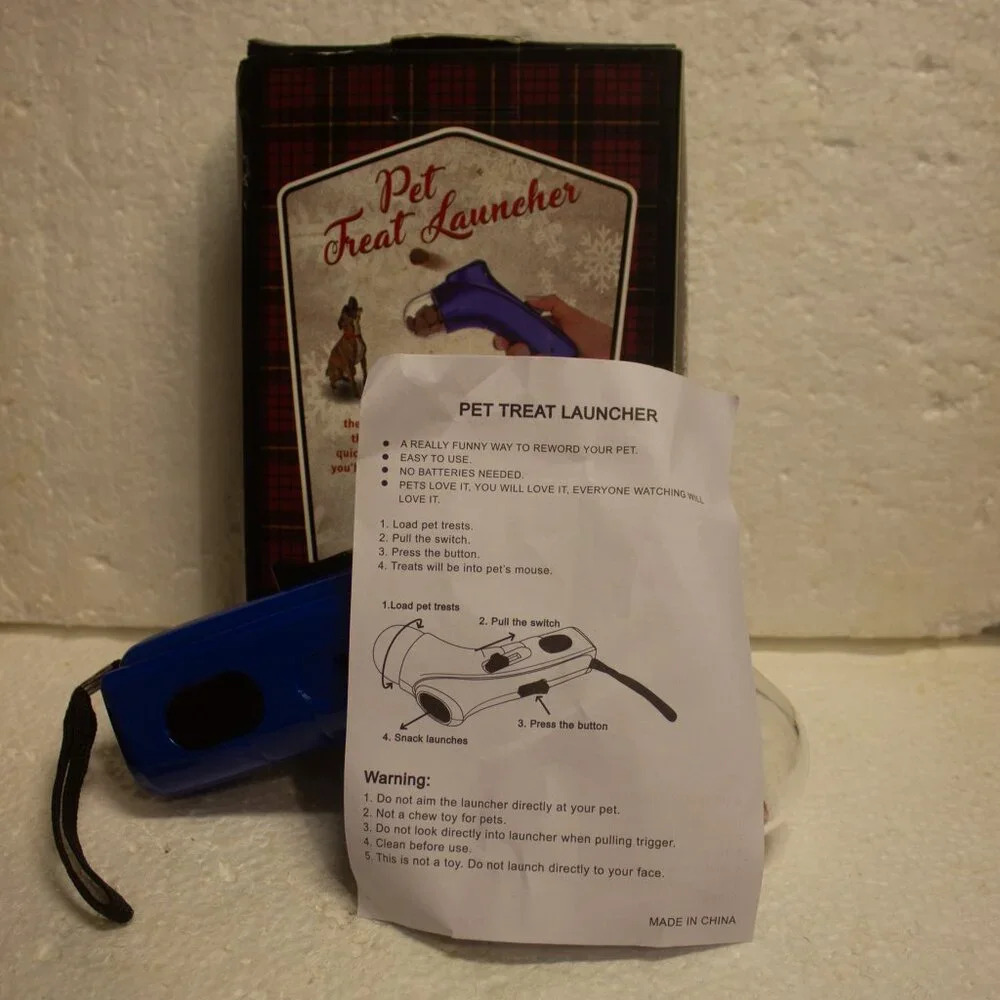 The Original Workshop Pet/Dog Treat Launcher Pet Reward Toy New Never Used